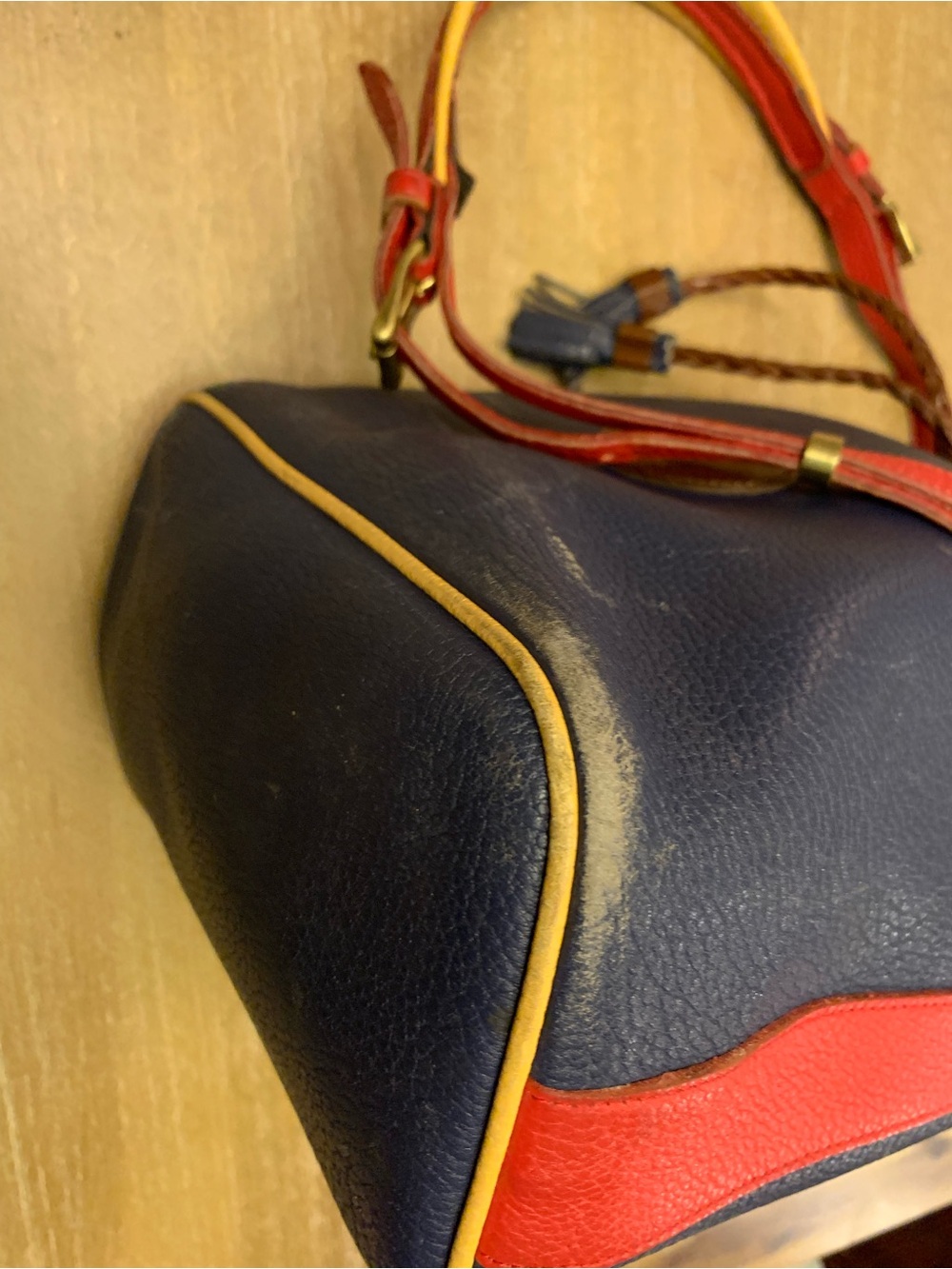 Dooney & Bourke Navy, Red & Yellow Leather Drawstring Bucket Bag - Picture 5 of 16